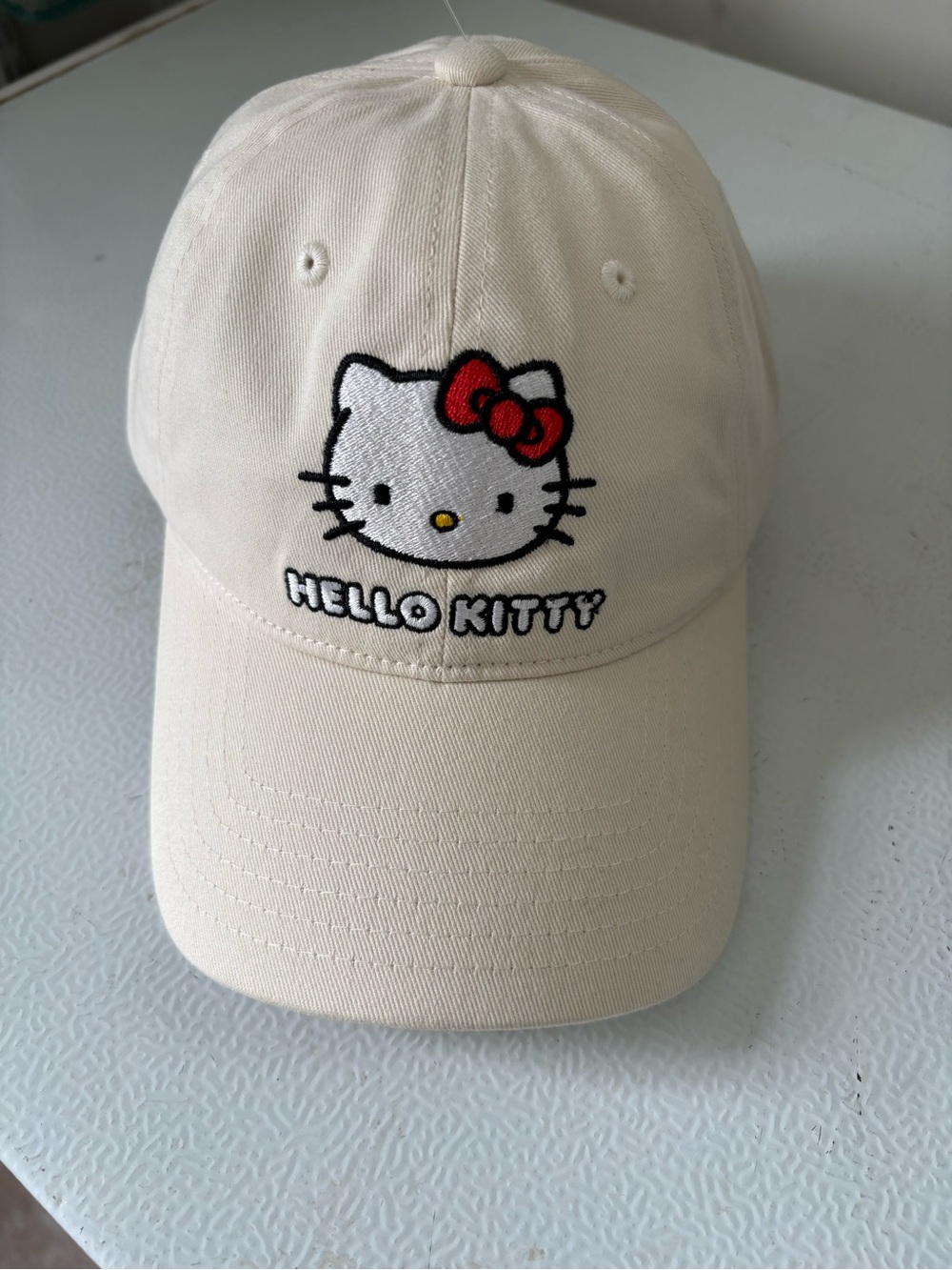 Hello Kitty Cream Cap with Red Bow Embroidery